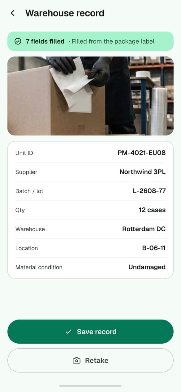 The warehouse record screen: fields filled automatically from a scanned pallet label.
